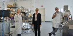 Udder Delight owner, Kristine Shoberg (center) with employees, Charlotte Ruth (left) and Daniel Morales (right) in the new manufacturing facility